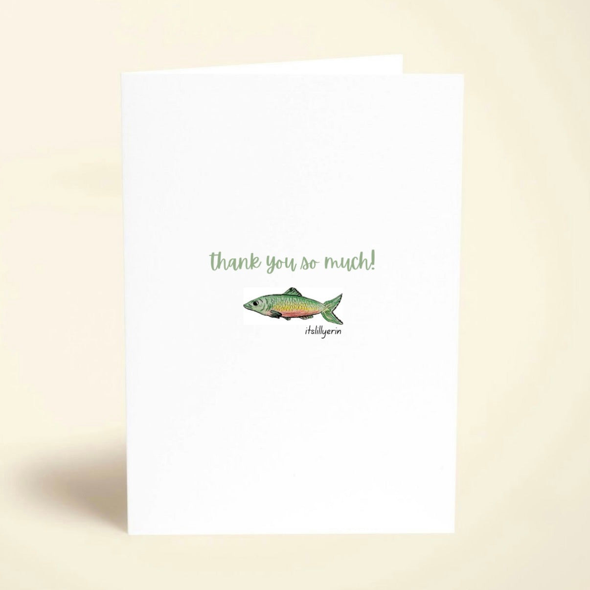 Card with a fish illustration and 'thank you so much!' text on a beige background