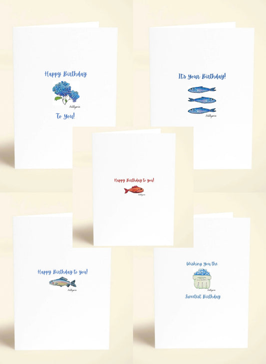 Set of birthday cards with various illustrations on a beige background